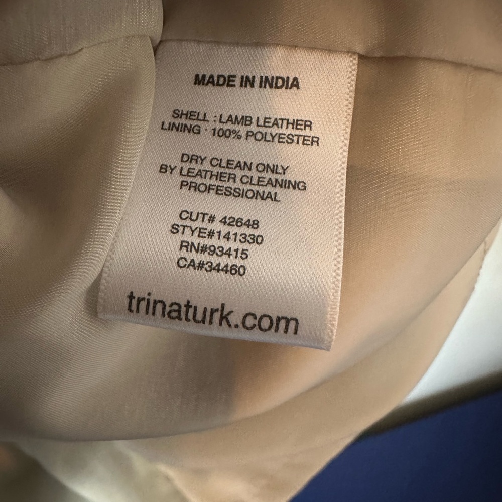Trina Turk Cream Leather Sleeveless Dress with Black Trim - Picture 11 of 16